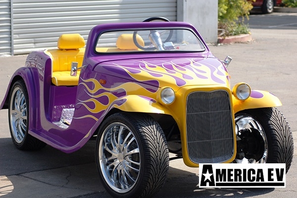 Purple California Roadster with Yellow Flames affordable golf cart rental, golf cart rent kentucky