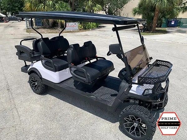 White Aluma 6 Passenger Lifted Golf Cart affordable golf cart rental, golf cart rent kentucky